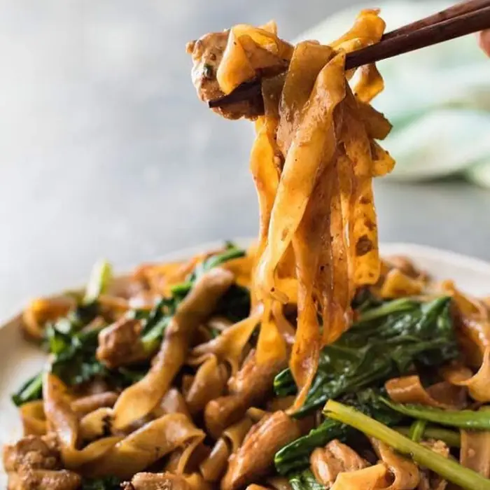 Bangkok's Wide-Noodle Wok Symphony with Greens