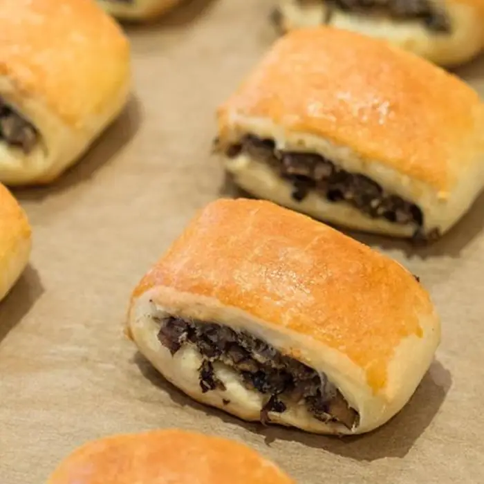 Poland's Golden Pastry Logs Stuffed with Beef Joy