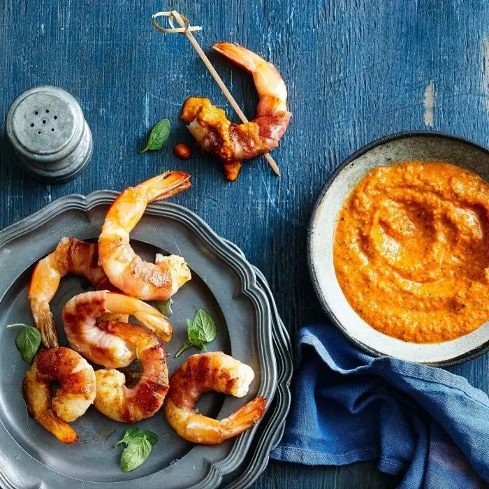 Spain's Fire-Kissed Shrimp Dipping Into Nutty Red Gold